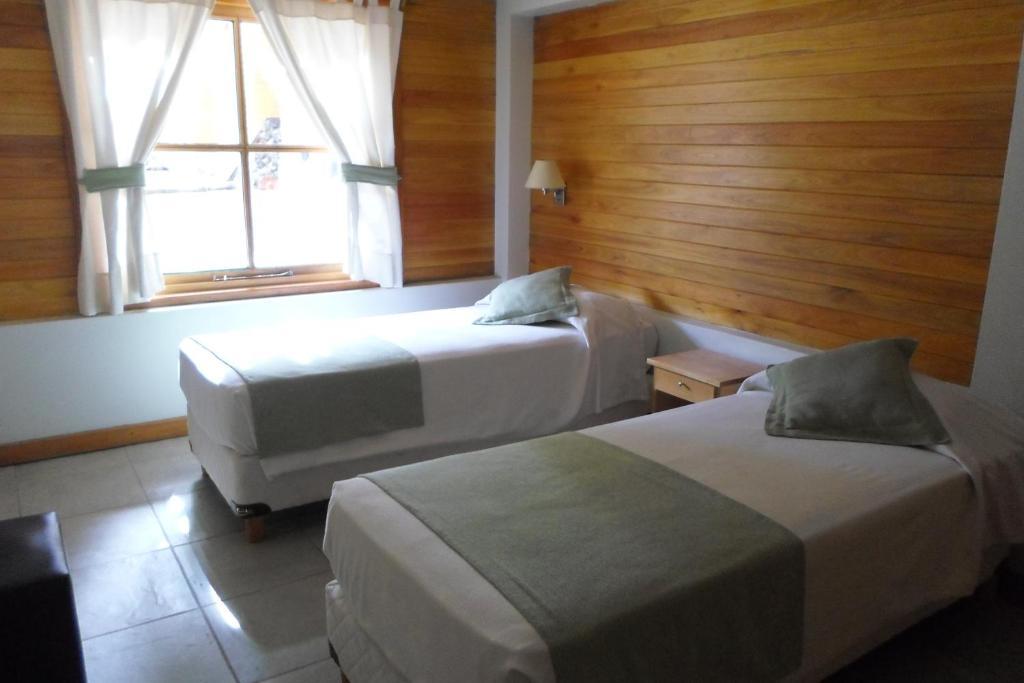 Apart Hotel Robles del Sur San Martín de los Andes Habitación foto